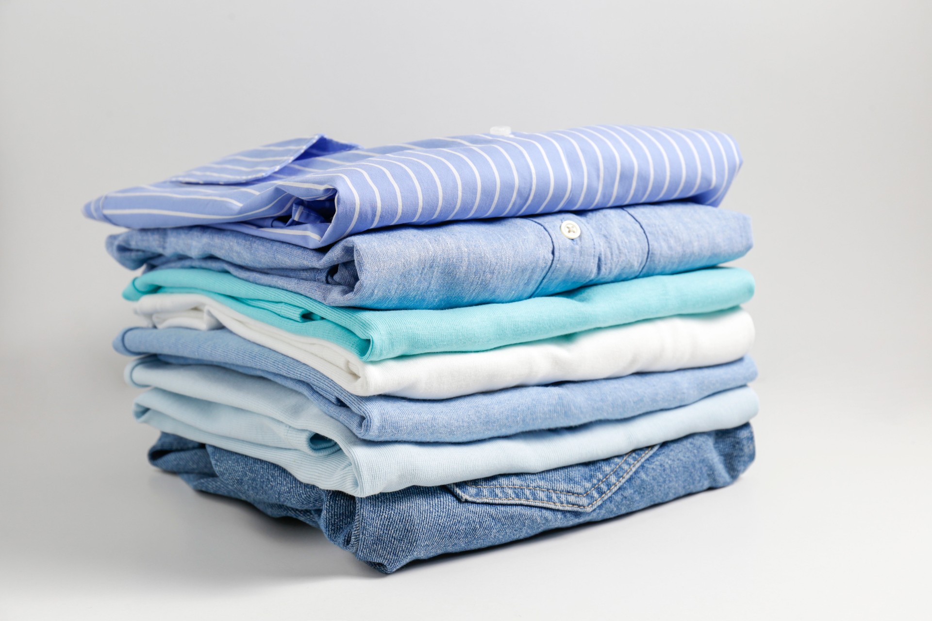 Clean garment neatly folded after laundry over bright background